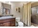 Stylish bathroom featuring granite countertop vanity and glass-enclosed shower at 2486 S Monroe St. St, Denver, CO 80210