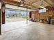 Spacious garage with ample storage and visible driveway at 6501 Welch Ct, Arvada, CO 80004
