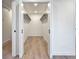 Spacious walk-in closet with ample storage, offering organization and convenience for all your wardrobe needs at 6501 Welch Ct, Arvada, CO 80004