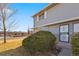 A charming side view of the residence exhibiting neat landscaping and appealing architectural details at 6905 Mariposa St # C, Denver, CO 80221