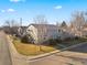 Aerial view of the home on a corner lot with mature landscaping and a well-kept lawn at 6905 Mariposa St # C, Denver, CO 80221