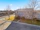 Aerial view of the home on a corner lot with mature trees in the yard at 6905 Mariposa St # C, Denver, CO 80221