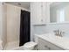 Cozy bathroom featuring a shower-tub combo, sleek vanity, and modern toilet at 1584 S Fraser Way, Aurora, CO 80012