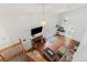 Bright and airy living room with high ceilings, a fireplace, and hardwood floors at 1584 S Fraser Way, Aurora, CO 80012