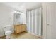 Clean bathroom features a vanity, toilet, and shower with a curtain at 10129 W 55Th Dr # 3, Arvada, CO 80002