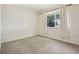 Bright bedroom with a window and neutral carpet at 10129 W 55Th Dr # 3, Arvada, CO 80002
