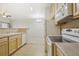 Kitchen features a sink, dishwasher, refrigerator, and oven at 10129 W 55Th Dr # 3, Arvada, CO 80002