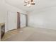 Bright and spacious living room with neutral carpet, fireplace and natural light at 10129 W 55Th Dr # 3, Arvada, CO 80002