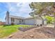 Charming single Gathering home with manicured lawn, beautiful flower beds, and a two car garage at 4182 S Joplin St, Aurora, CO 80013