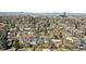 Aerial neighborhood view of homes and landscaping with mountains in the distance at 1430 S Glencoe St, Denver, CO 80222