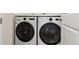 Laundry room featuring new LG washer and dryer, and lots of room at 1430 S Glencoe St, Denver, CO 80222