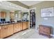 Spacious bathroom with double vanity, walk-in closet, and modern finishes at 1540 W Briarwood Ave, Littleton, CO 80120