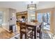 Breakfast nook features an eat-in kitchen area with access to outdoor patio at 1540 W Briarwood Ave, Littleton, CO 80120