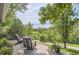 Cozy outdoor patio with comfortable seating and serene green views at 1540 W Briarwood Ave, Littleton, CO 80120