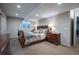 Bedroom with carpet, a double window, a dresser, and decorative lighting at 1030 Timbercrest Dr, Castle Pines, CO 80108