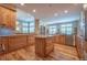 Bright, updated kitchen with stainless appliances, hardwood floors, and granite countertops at 1030 Timbercrest Dr, Castle Pines, CO 80108