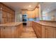 Beautiful kitchen boasts custom cabinets, granite counters, and modern appliances at 1030 Timbercrest Dr, Castle Pines, CO 80108
