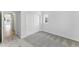 Carpeted bedroom featuring a large closet with sliding doors and a window at 15501 E 112Th Ave # 6F, Commerce City, CO 80022