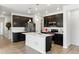 Stylish kitchen featuring stainless steel appliances, granite countertops, and a functional kitchen island at 15501 E 112Th Ave # 6F, Commerce City, CO 80022