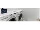 Laundry room area featuring a modern washer and dryer set at 15501 E 112Th Ave # 6F, Commerce City, CO 80022