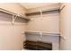 Walk-in closet features plenty of shelving and shoe storage space for optimal organization at 4483 S Fundy St, Centennial, CO 80015