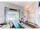 Dining room with large windows, elegant decor, and ample seating at 4483 S Fundy St, Centennial, CO 80015