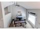 Aerial shot of a lovely dining room with modern decor, table, and an inspirational sign at 4483 S Fundy St, Centennial, CO 80015
