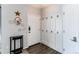 Stylish foyer featuring modern flooring, coat hooks, and neutral paint tones at 4483 S Fundy St, Centennial, CO 80015