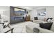 Cozy living room boasts a modern fireplace, stylish decor, and comfortable seating, perfect for relaxing and entertaining at 25548 E Fair Dr, Aurora, CO 80016