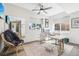 Bright home office with modern desk, comfortable seating and a view to enhance productivity and comfort at 25548 E Fair Dr, Aurora, CO 80016