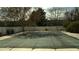 Covered outdoor pool area surrounded by greenery, offering a private retreat at 9440 E Girard Ave # 1, Denver, CO 80231