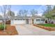 Delightful single-story home with an attached garage, and a well-kept lawn with attractive curb appeal at 712 S Longmont Ave, Lafayette, CO 80026