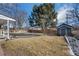 Large backyard featuring mature tree and storage shed at 2694 S Krameria St, Denver, CO 80222