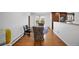 Light-filled dining room adjacent to kitchen, offering a view of the patio at 2694 S Krameria St, Denver, CO 80222