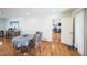 Dining room with hardwood floors and a view into the office space at 2694 S Krameria St, Denver, CO 80222