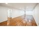 Spacious living room features beautiful wood floors and recessed lighting at 2694 S Krameria St, Denver, CO 80222