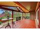 Spacious deck offering amazing views of the surrounding forest and gorgeous railing design at 29832 Dorothy Rd, Evergreen, CO 80439