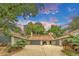 Charming home featuring multiple car garage, stone accents, and well-maintained landscaping at 3807 Paseo Del Prado, Boulder, CO 80301