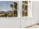 Bright room featuring windows with views of trees and mountains in the background at 3807 Paseo Del Prado, Boulder, CO 80301