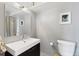 Modern bathroom with large mirror, vanity, and clean, minimalist design at 1090 N Lafayette St # 503, Denver, CO 80218