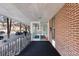 Welcoming building entrance with security doors, brick accents, and convenient resident access at 1090 N Lafayette St # 503, Denver, CO 80218