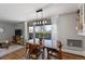 Open dining area with views to the living room and access to a balcony at 1090 N Lafayette St # 503, Denver, CO 80218