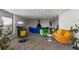 Eclectic living room with colorful decor and comfortable seating, ideal for relaxing and socializing at 1090 N Lafayette St # 503, Denver, CO 80218