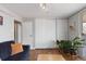 Cozy living room featuring wood floors, walk-out to balcony, and a contemporary design at 1090 N Lafayette St # 503, Denver, CO 80218