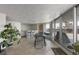 Open living space featuring sleek flooring, modern lighting, and large windows, perfect for entertaining at 1090 N Lafayette St # 503, Denver, CO 80218