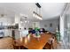 Spacious living space with access to a modern kitchen and dining area at 1090 N Lafayette St # 503, Denver, CO 80218