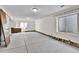 Spacious unfinished basement with natural light, presenting a blank canvas for renovation and personalization at 18874 E Colorado Dr, Aurora, CO 80017