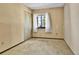 Bedroom with a window, closet, and neutral carpet at 18874 E Colorado Dr, Aurora, CO 80017