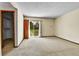 Spacious bedroom with sliding glass door to backyard and access to closet at 18874 E Colorado Dr, Aurora, CO 80017