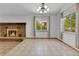Bright dining area with views of the backyard and an open connection to the cozy living room at 18874 E Colorado Dr, Aurora, CO 80017